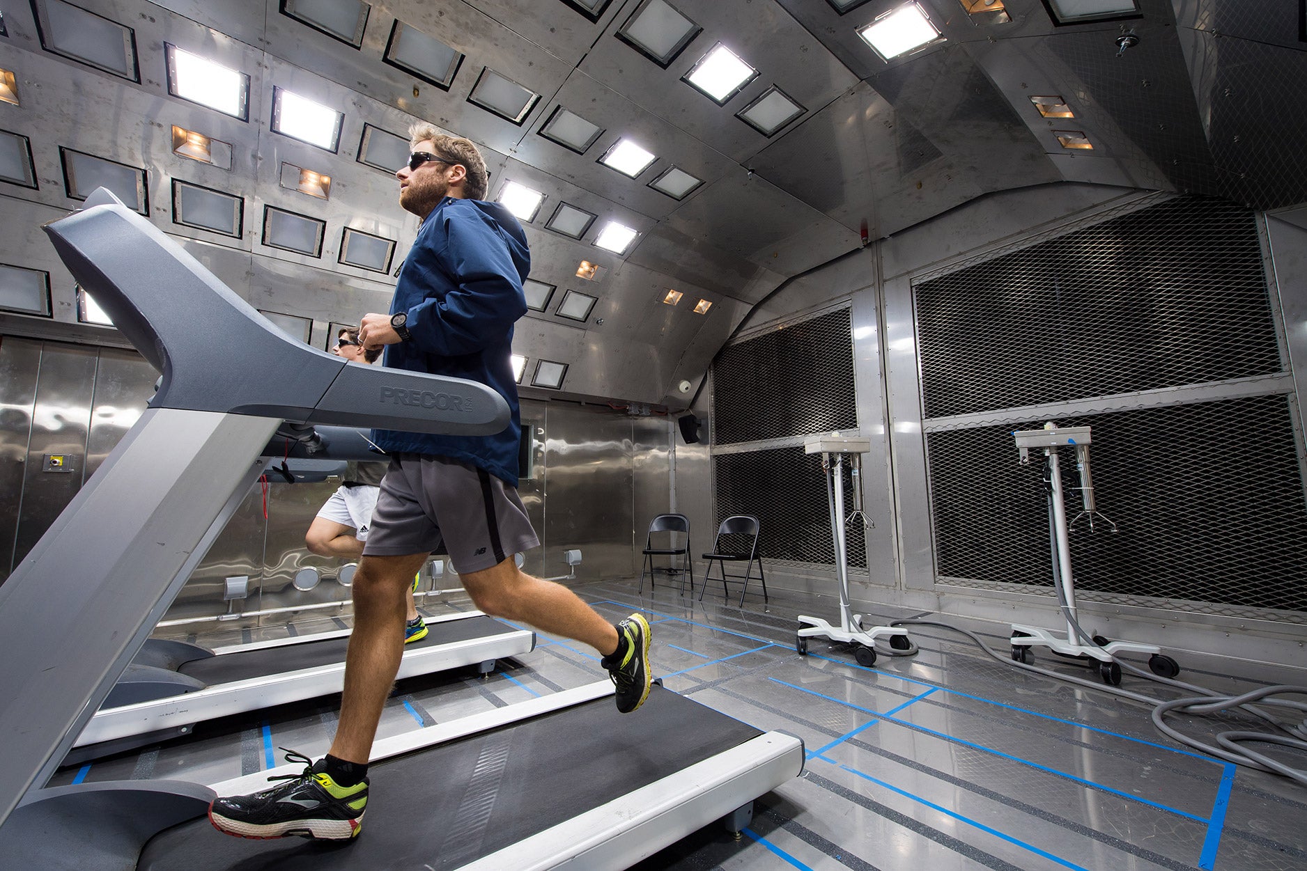 Person running on a treadmill in the new testing facility