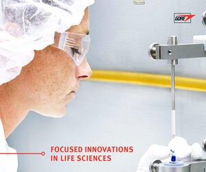 Brochure cover shows a lab technician in protective gear operating test machinery.